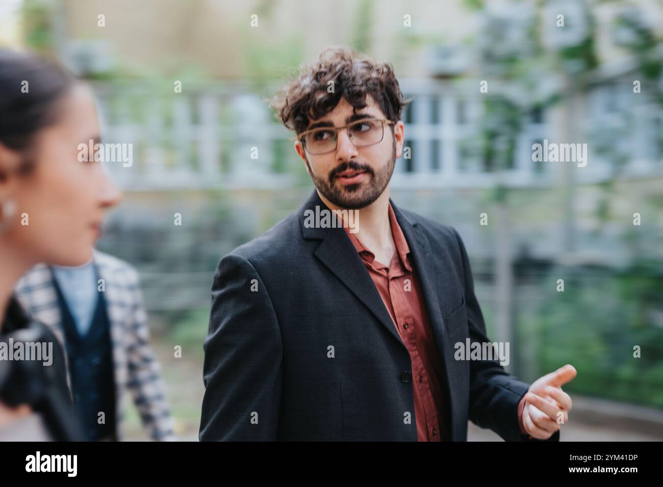 Business people having a conversation outdoors in urban setting Stock ...