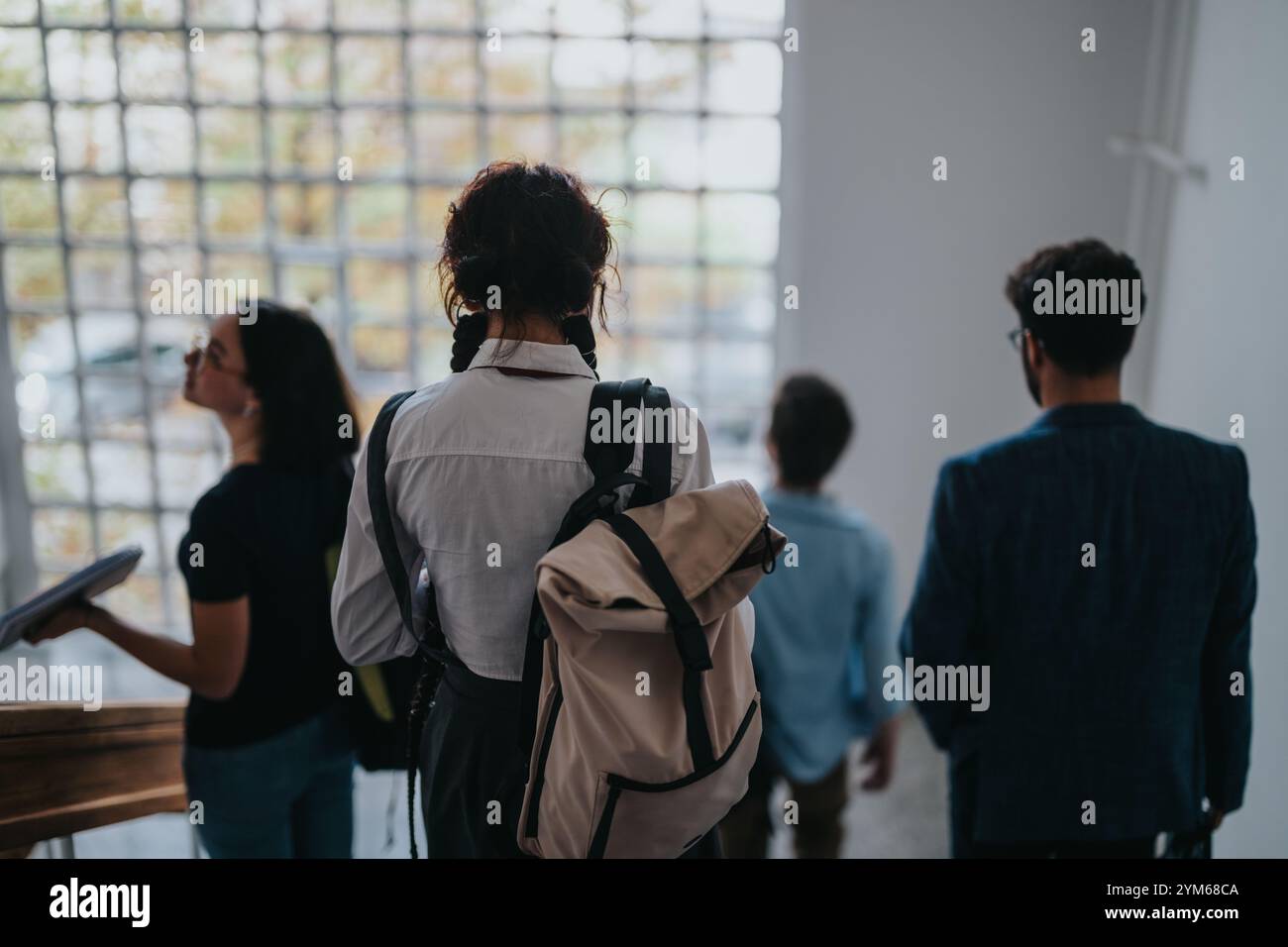 Group diverse students walking hi-res stock photography and images - Alamy