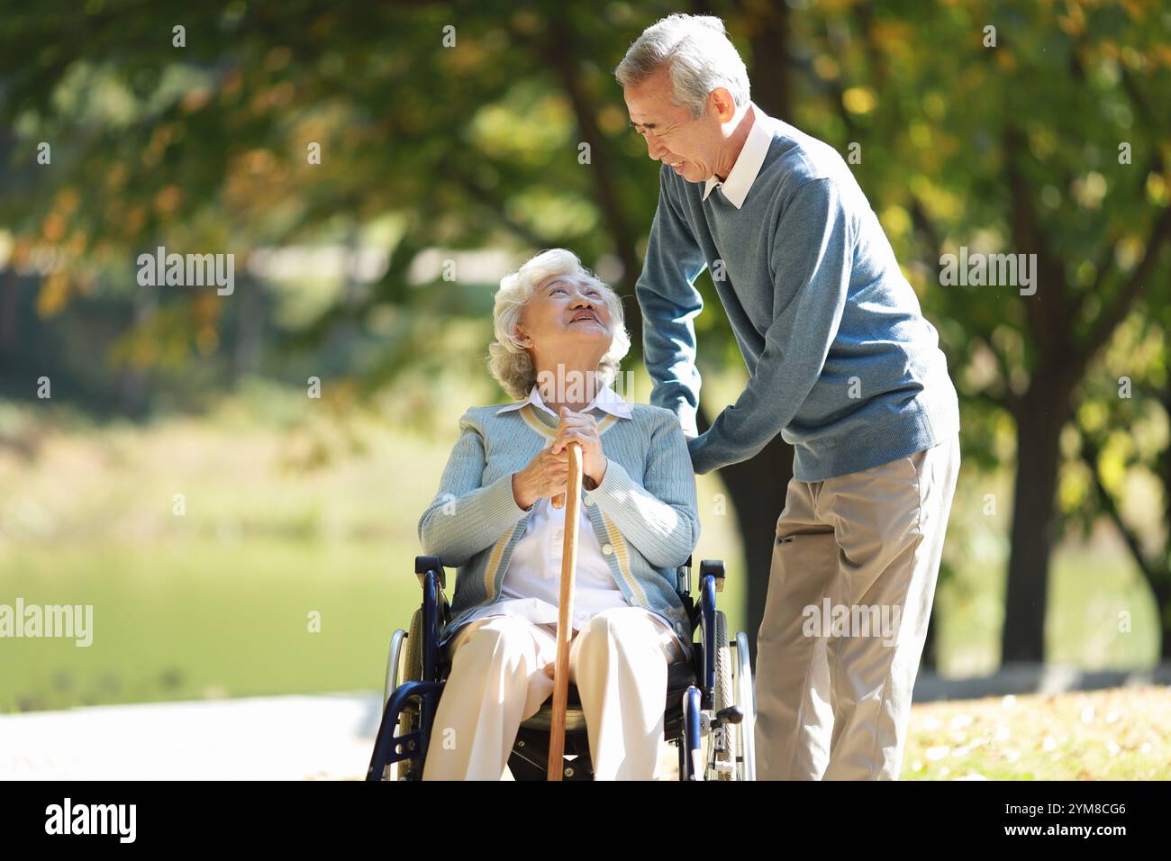 Older people smiling and talking Stock Photo - Alamy