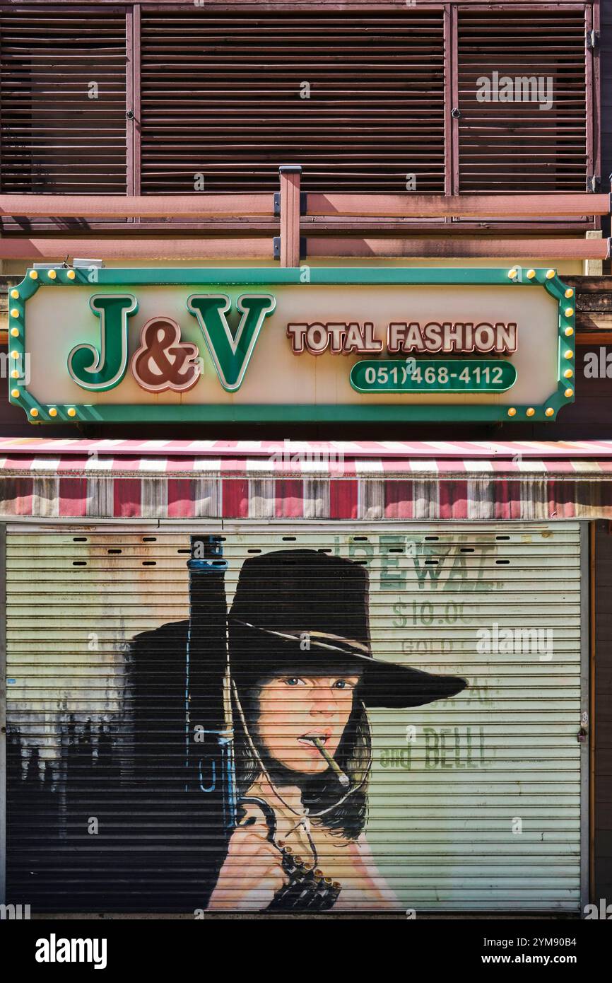 Mural design on rolling door at Busan Texas Street Stock Photo