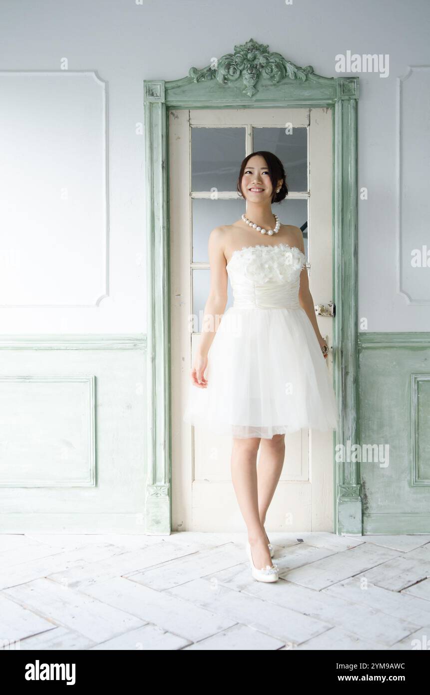 Woman wearing cute dress stand hi-res stock photography and images - Alamy