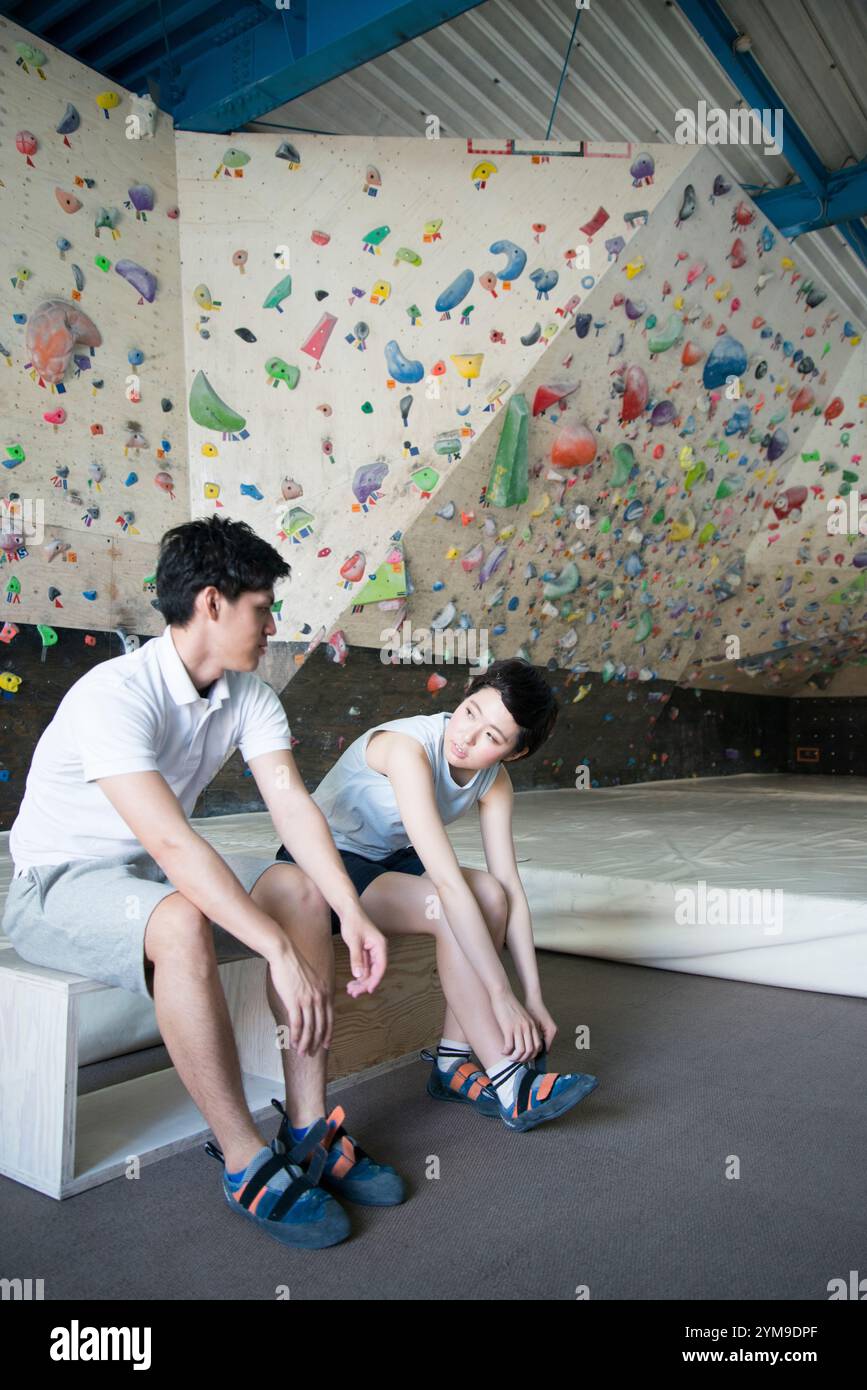 Man climbing indoor wall hi-res stock photography and images - Alamy