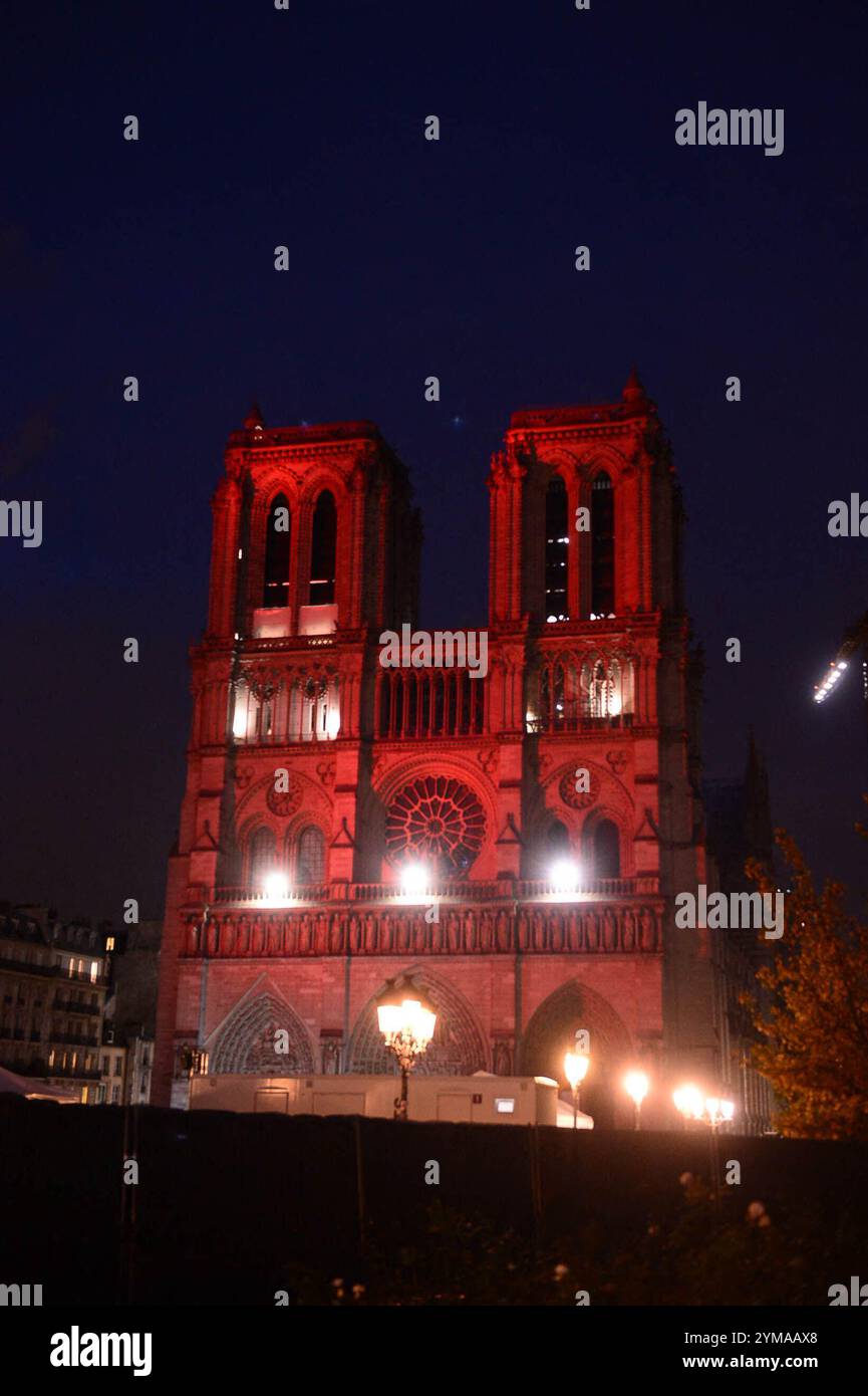 Paris, France. 20th Nov, 2024. Notre-Dame cathedral illuminated in red, as part of the Red Week, an event organised by the Aide à l'Eglise en Detresse (AED) association, to raise awareness to the plight of the Christian population persecuted for their faith, in Paris, France on November 20, 2024. Photo by Karim Ait Adjedjou/ABACAPRESS.COM Credit: Abaca Press/Alamy Live News Stock Photo