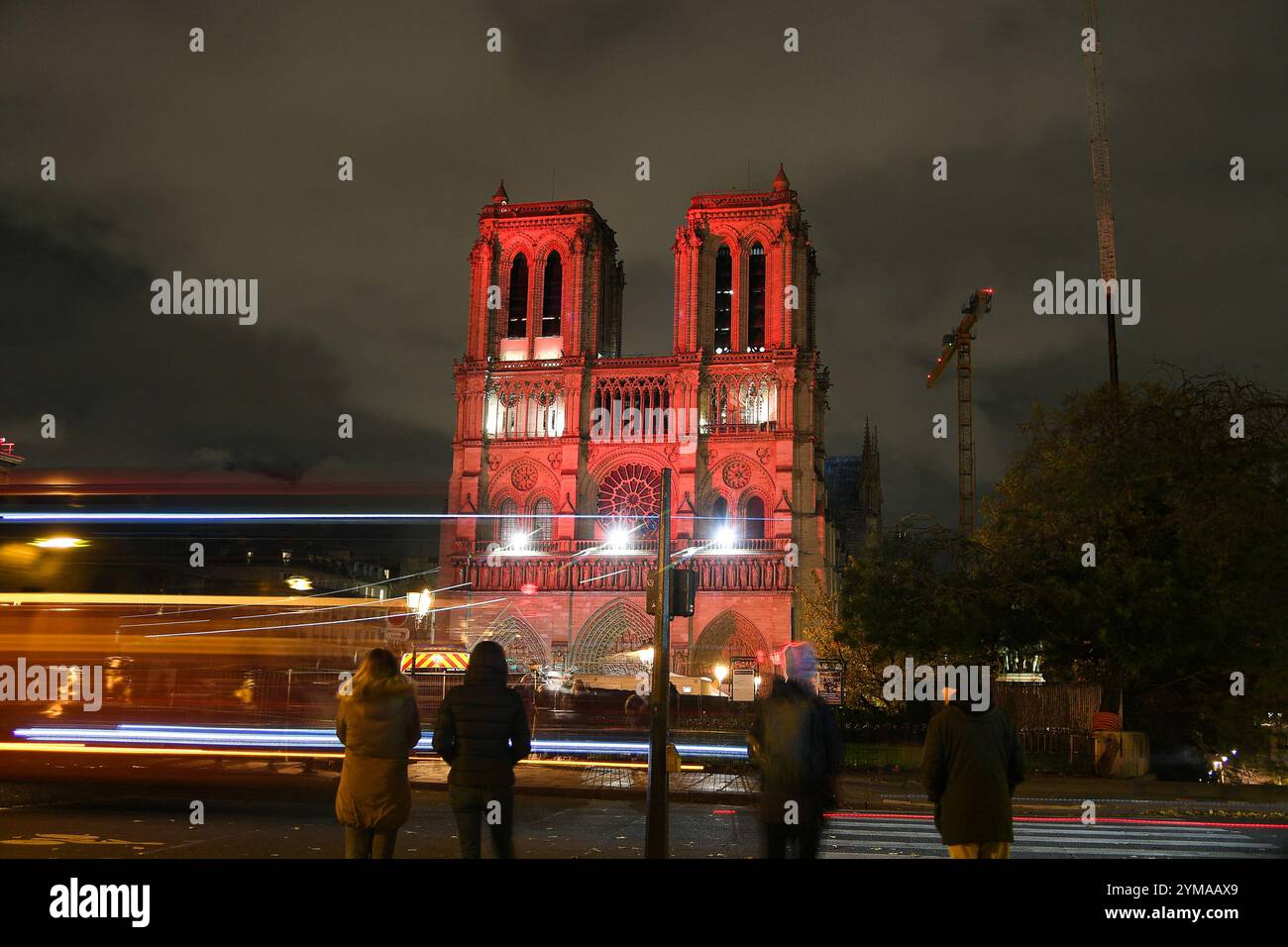 Paris, France. 20th Nov, 2024. Notre-Dame cathedral illuminated in red, as part of the Red Week, an event organised by the Aide à l'Eglise en Detresse (AED) association, to raise awareness to the plight of the Christian population persecuted for their faith, in Paris, France on November 20, 2024. Photo by Lionel Urman/ABACAPRESS.COM Credit: Abaca Press/Alamy Live News Stock Photo