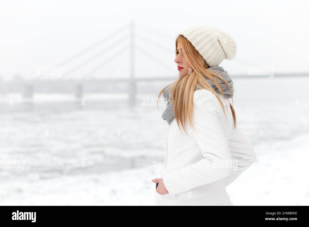 Winter portrait of beautiful blonde young woman Stock Photo - Alamy