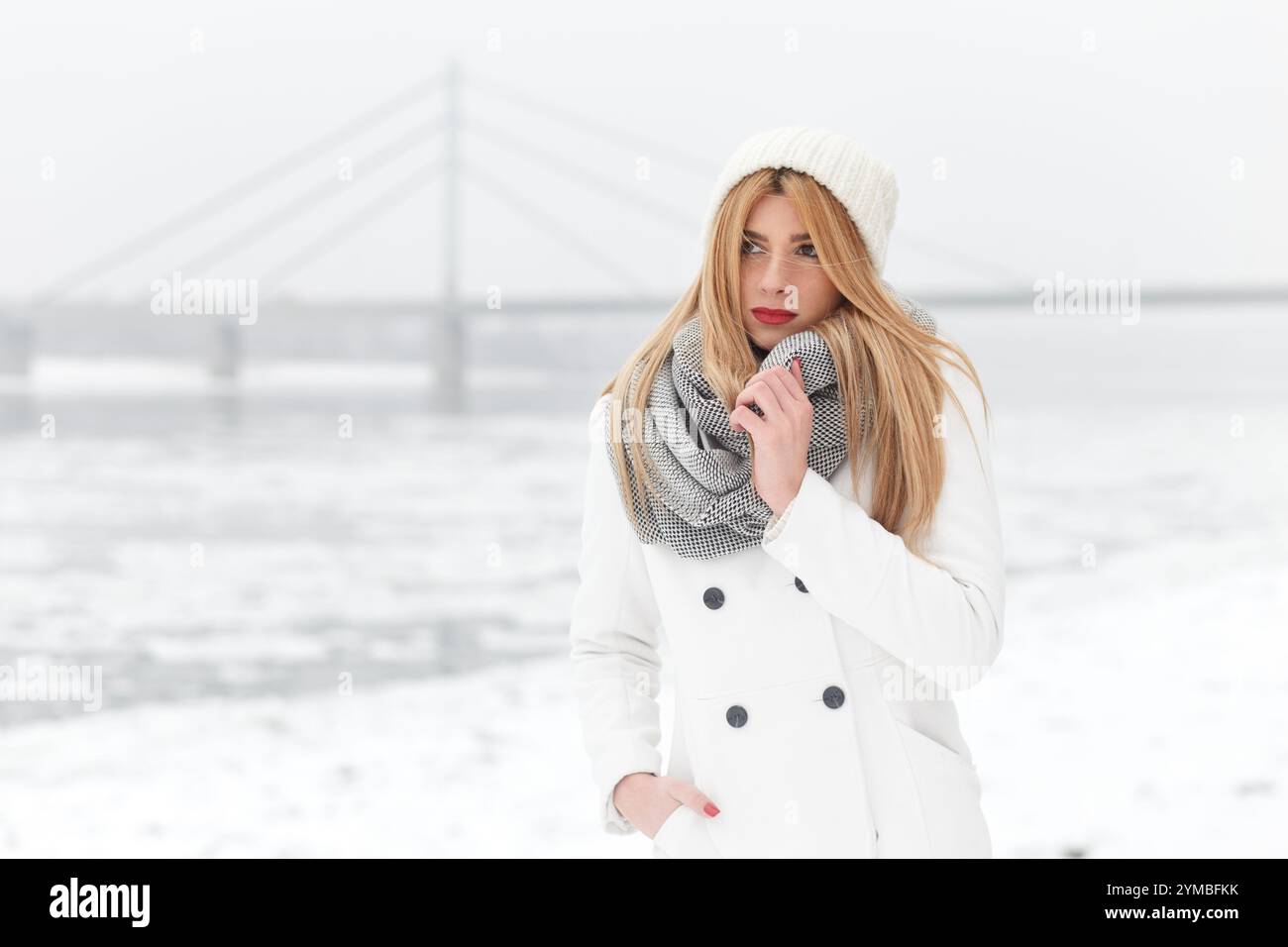 Winter portrait of beautiful blonde young woman Stock Photo - Alamy