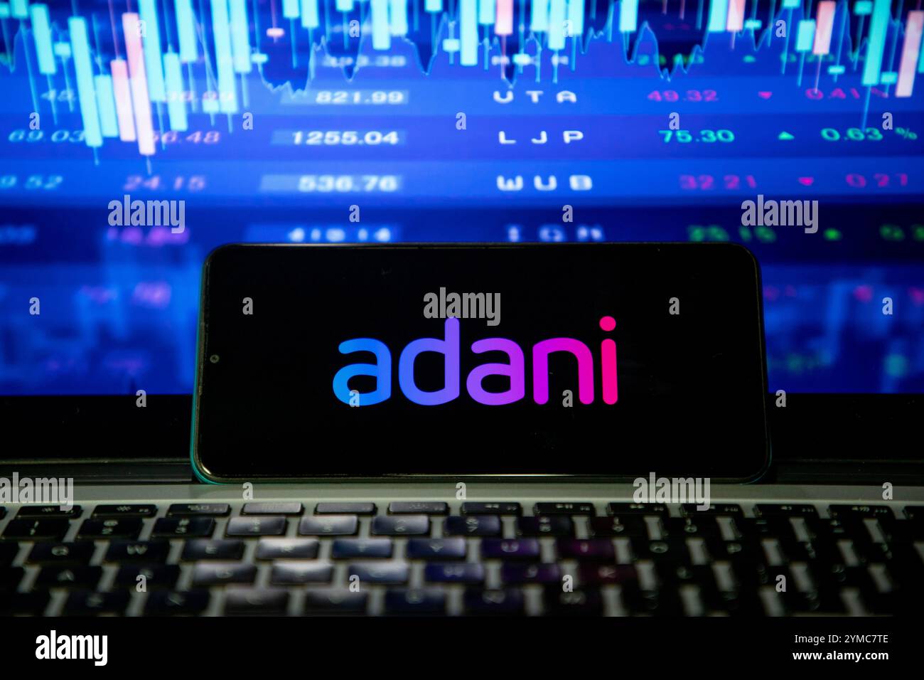 In this photo illustration the Adani logo is seen on mobile phone