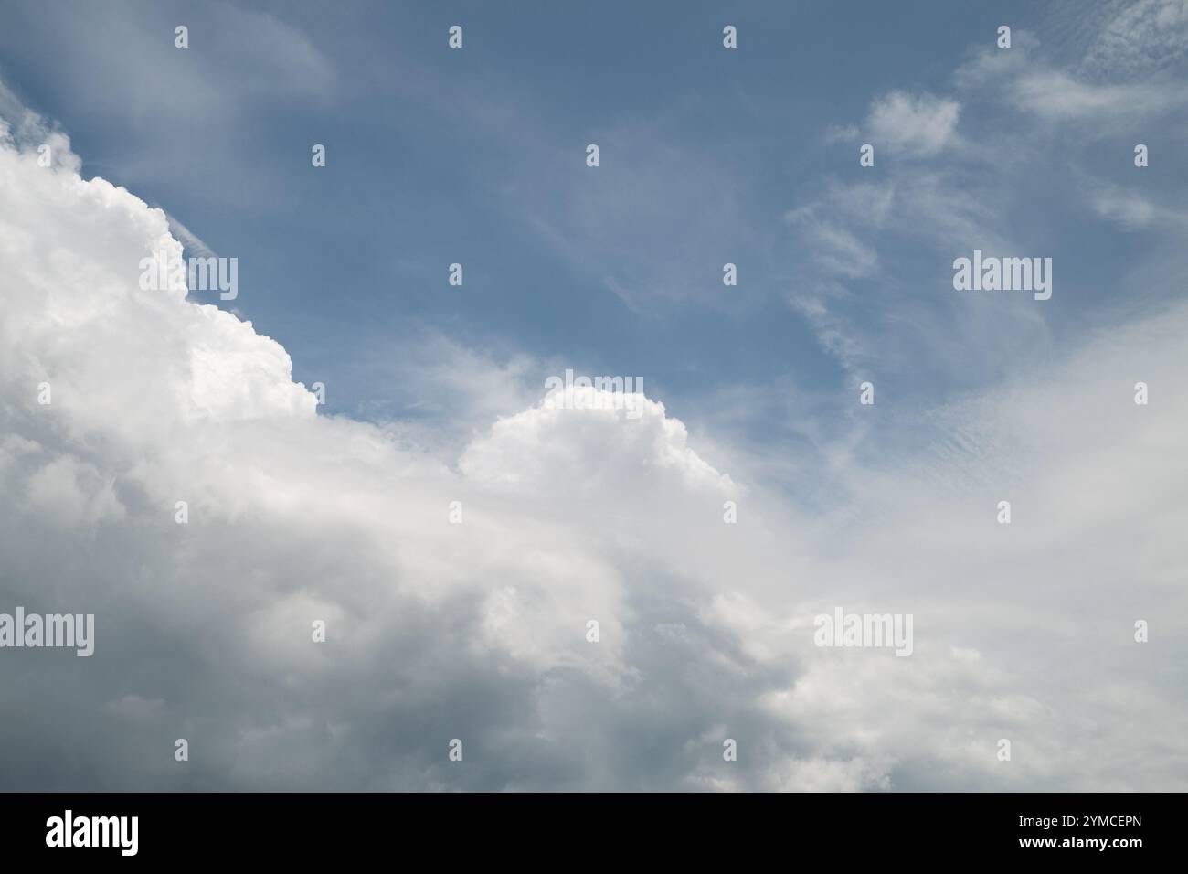 Thick white clouds decorated the clear blue sky Stock Photo - Alamy
