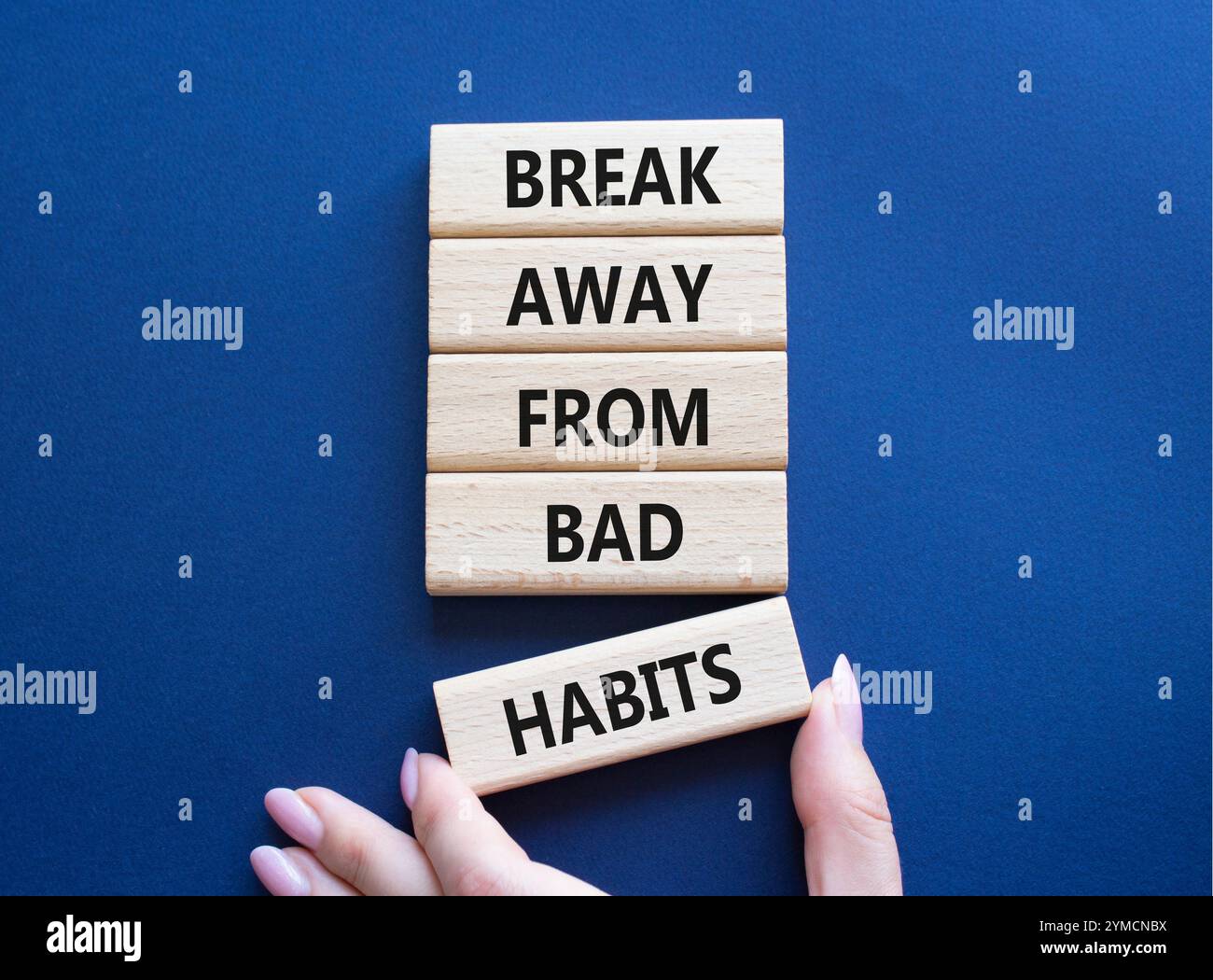 Break away from bad habits symbol. Wooden blocks with words Break away ...