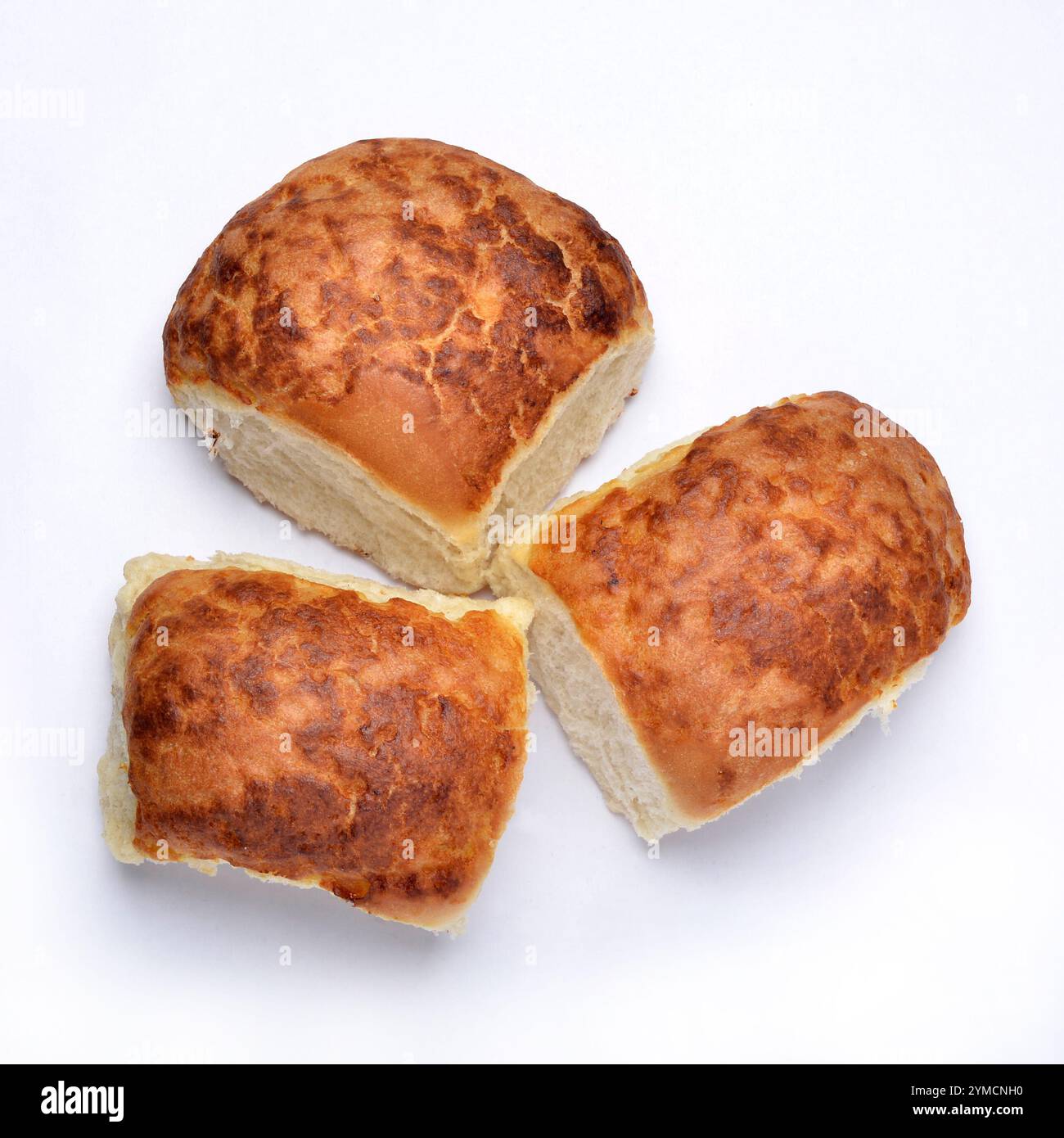 Three freshly baked tiger bread rolls top view on white Stock Photo