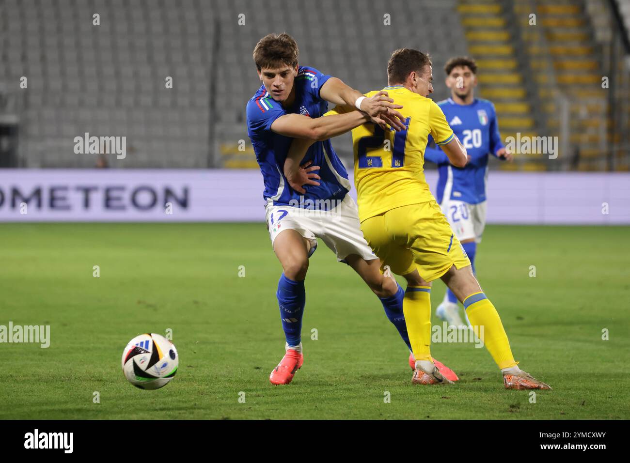 La Spezia, Italy. 19th Nov, 2024. Simone Pafundi of Italy looks on as team mate Marco Palestra takes on Maksym Bragaru of Ukraine during the International Friendly match at Stadio Alberto Picco, La Spezia. Picture credit should read: Jonathan Moscrop/Sportimage Credit: Sportimage Ltd/Alamy Live News Stock Photo