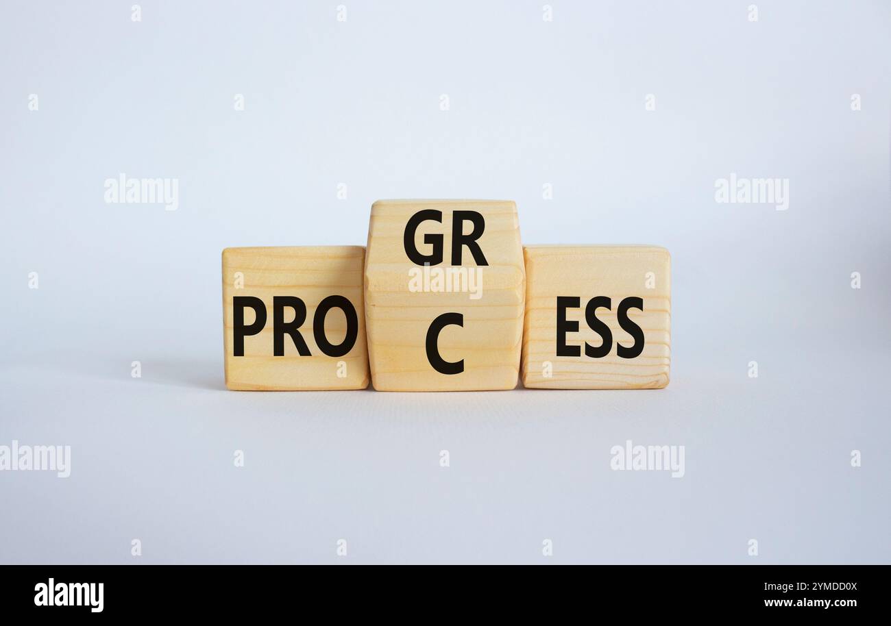 Process and progress symbol wooden cubes with words process and