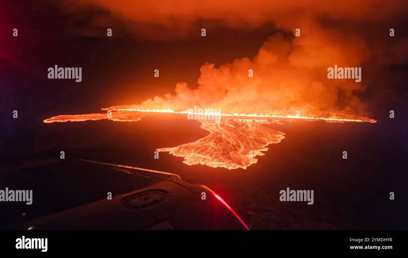 Grindavik, Iceland. 20th Nov, 2024. Lava and smoke spews from the latest eruption of the Sundhnúkur volcanic system on the Reykjanes peninsula of south-west Iceland, September 20, 2024 near Grindavik, Iceland. This is the seventh eruption in the past year of the volcano. Credit: Icelandic Civil Defense/Almannavarnadeild/Alamy Live News Stock Photo