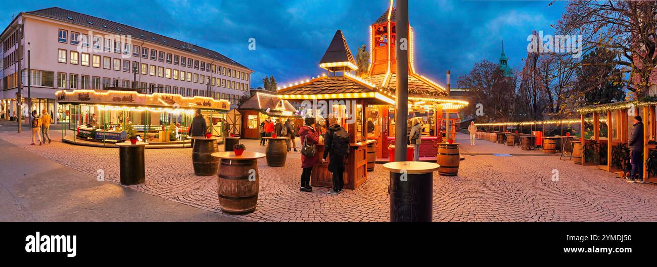 Panorama of the Darmstadt Christmas market with Christmas decorations and Christmas huts with beautiful lighting. Traditional German Christmas market Stock Photo