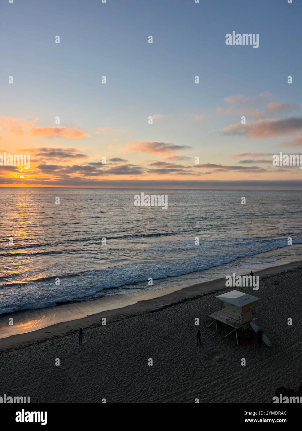 San Diego Beach At Sunset With Lifeguard Stand and Surfer - Smartphone Captured Stock Image