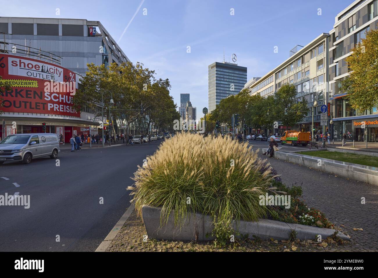 Tauentzienstrasse with green areas and Europa Centre with Mercedes star in Berlin, capital city, independent city, federal state Berlin, Germany, Euro Stock Photo