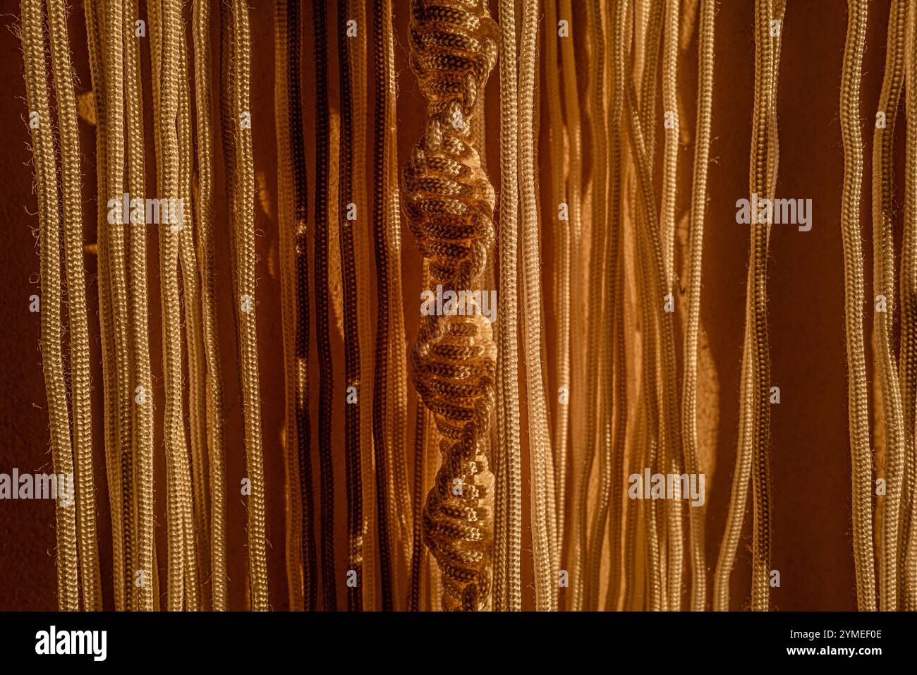 Macrame curtains in the evening light Stock Photo