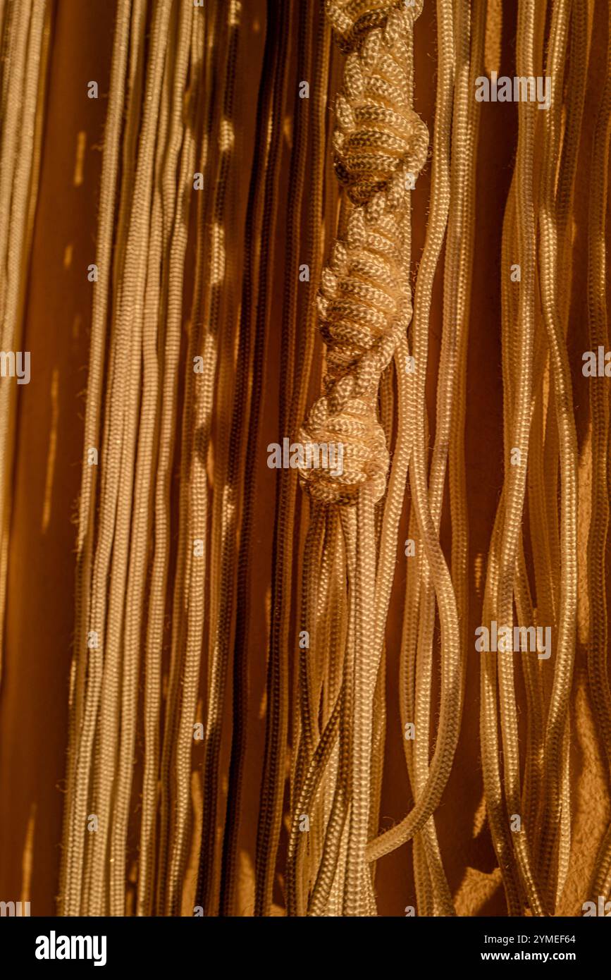 Macrame curtains in the evening light Stock Photo