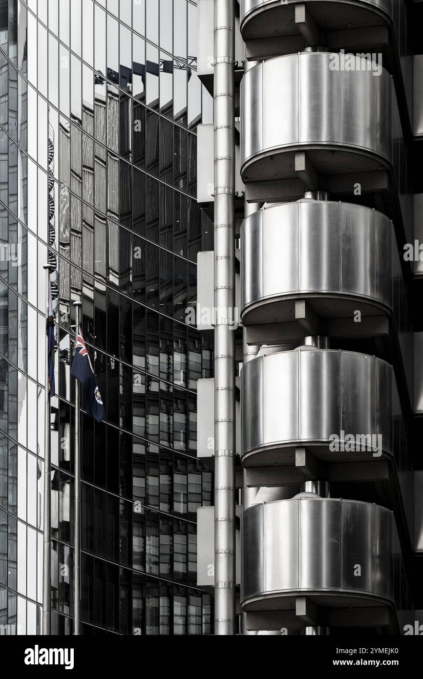 Modern building with metal cladding, reflecting the facade of an ...