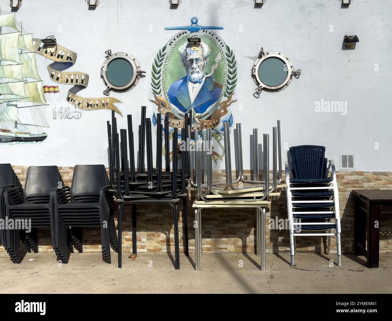 Portrait of the local figure Toribio Juan Goti 'Juanillo' painted on the wall of the port of Llanes, Asturias, Spain - Smartphone Captured Stock Image