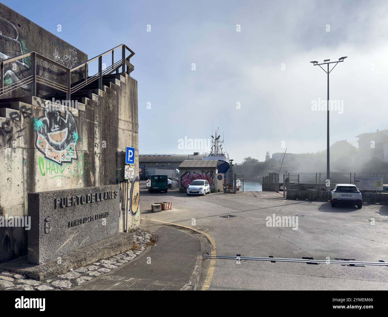 Entrance to the port of Llanes on a misty day, Asturias, Spain - Smartphone Captured Stock Image