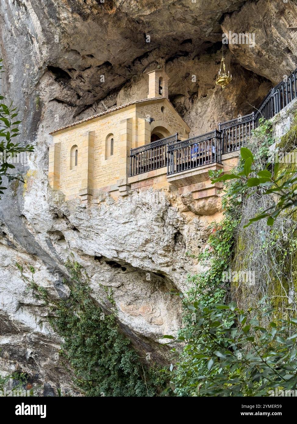 Sanctuary of the Holy Cave of Covadonga built into the rock, Asturias, Spain - Smartphone Captured Stock Image