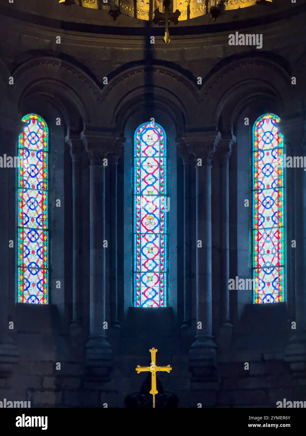 Victory Cross and glass windows inside the Basilica of Santa María la Real de Covadonga, Asturias, Spain - Smartphone Captured Stock Image
