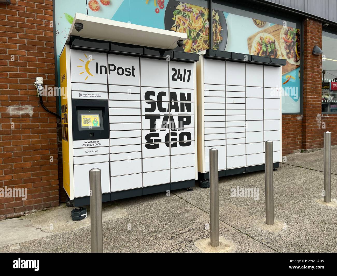 InPost Parcel Locker outside The Co-op in Killay. Swansea, Wales, United Kingdom. 8th November 2024. - Smartphone Captured Stock Image