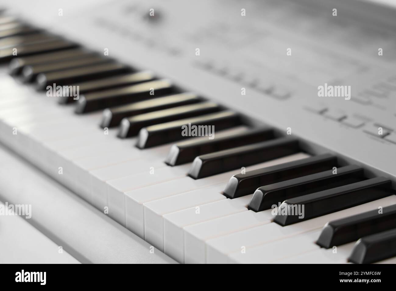 Modern synthesizer in room, closeup Stock Photo
