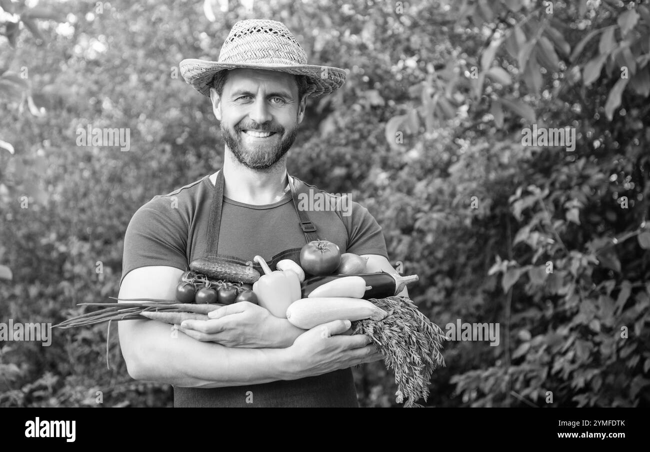 horticulturist in straw hat hold fresh ripe vegetables Stock Photo - Alamy