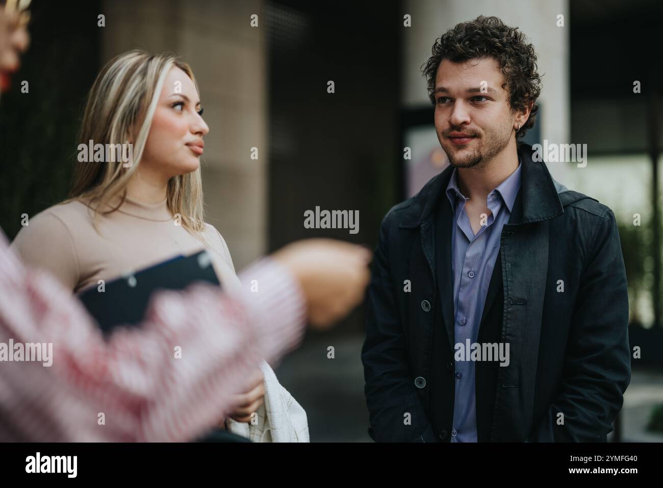 Two business professionals having a conversation outdoors Stock Photo