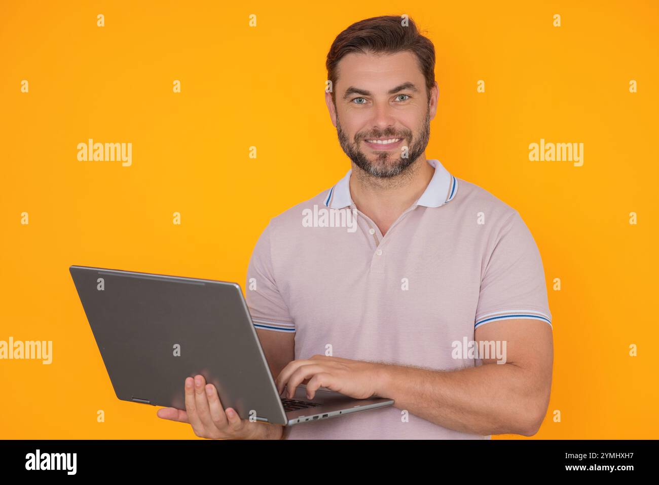 Man using laptop. Man worker watch video on computer laptop. Serious ...