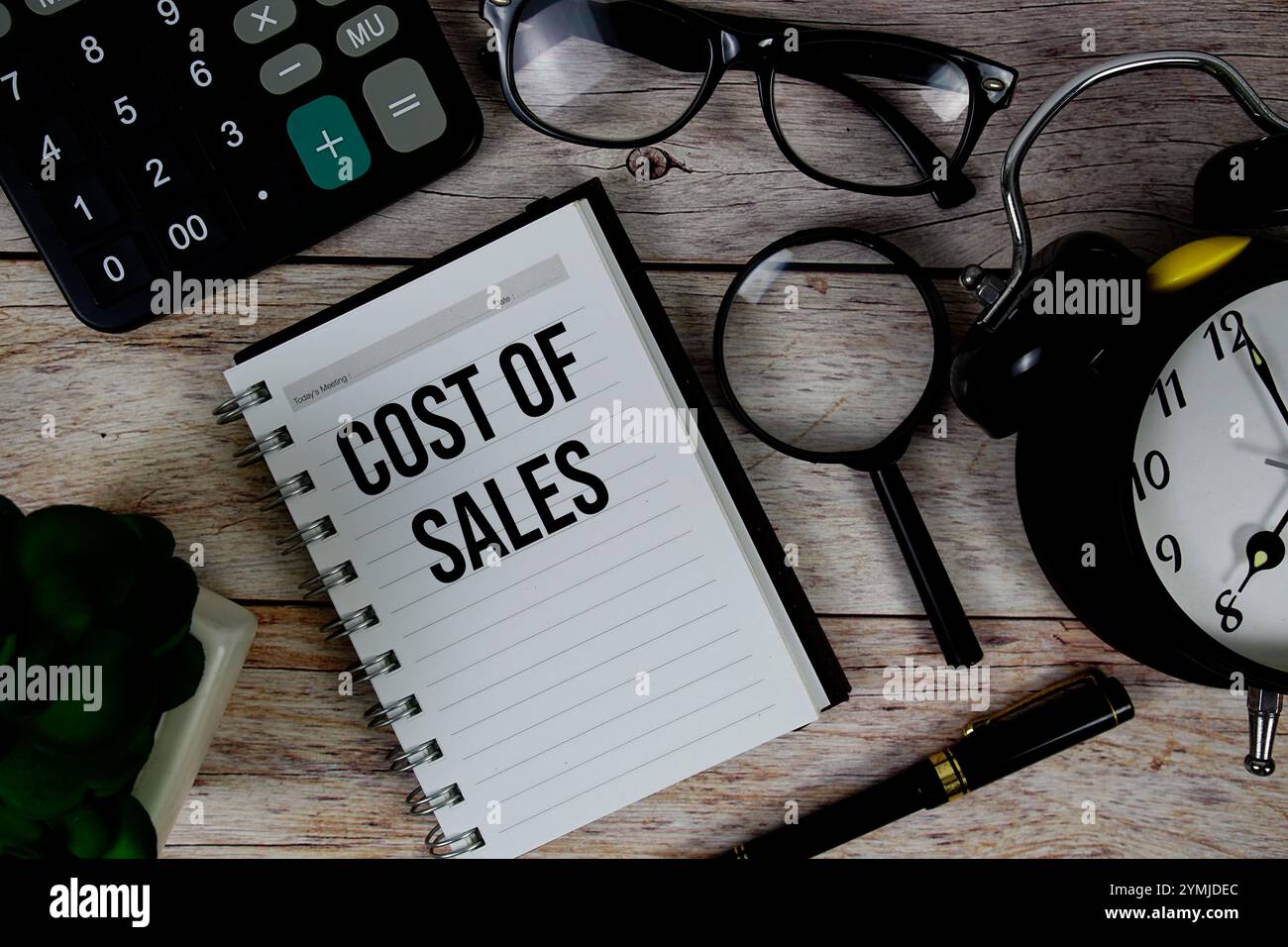 Cost Of Sales (COS) text on notepad, Business and Financial concept ...