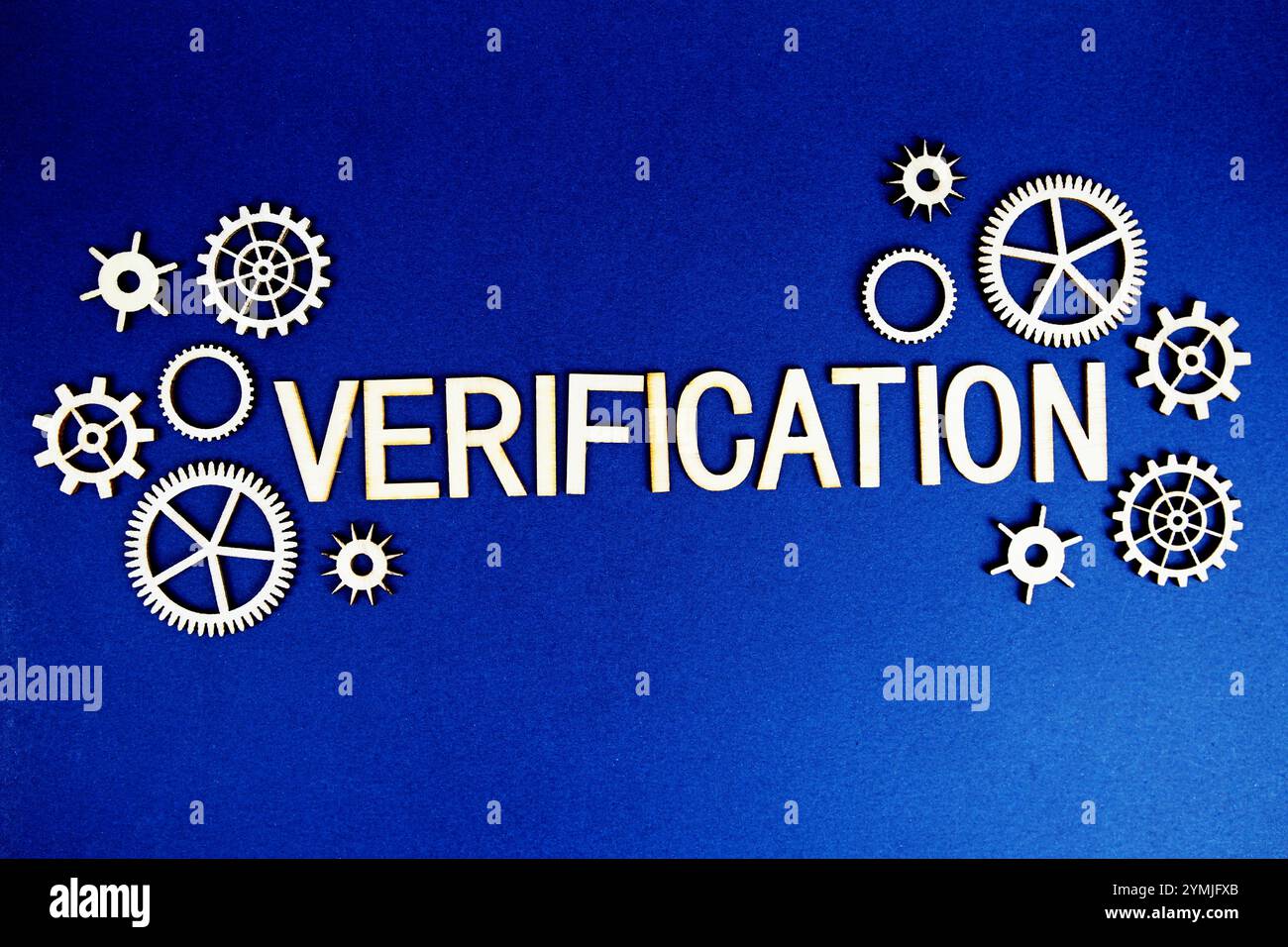 Verification alphabet letters with gears element on navy blue ...