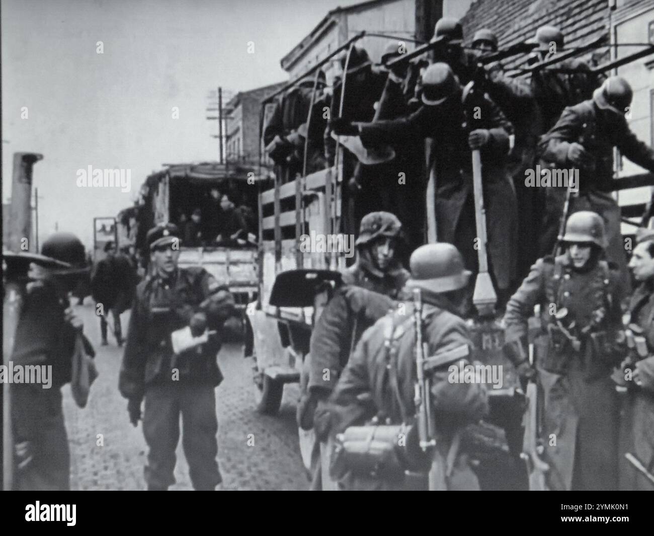 World War Two B&W photo German Troops of a Waffen SS Unit are unloaded ...