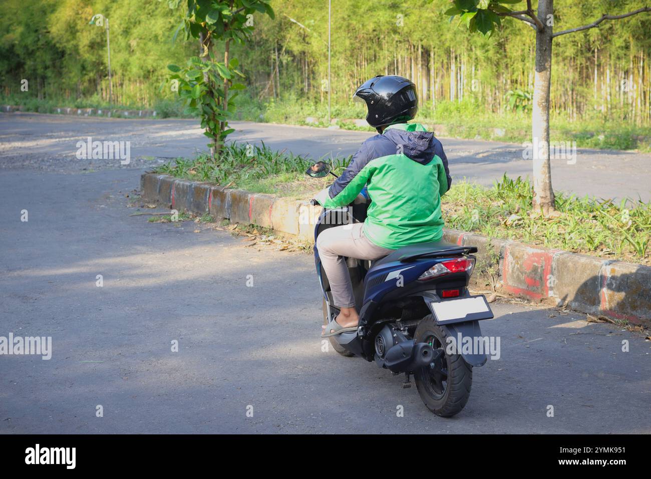 Vietnamese delivery rider hi-res stock photography and images - Alamy