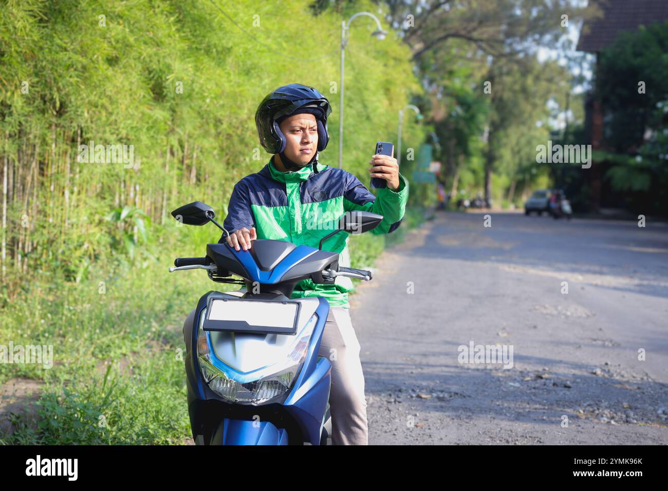 Vietnamese delivery rider hi-res stock photography and images - Alamy