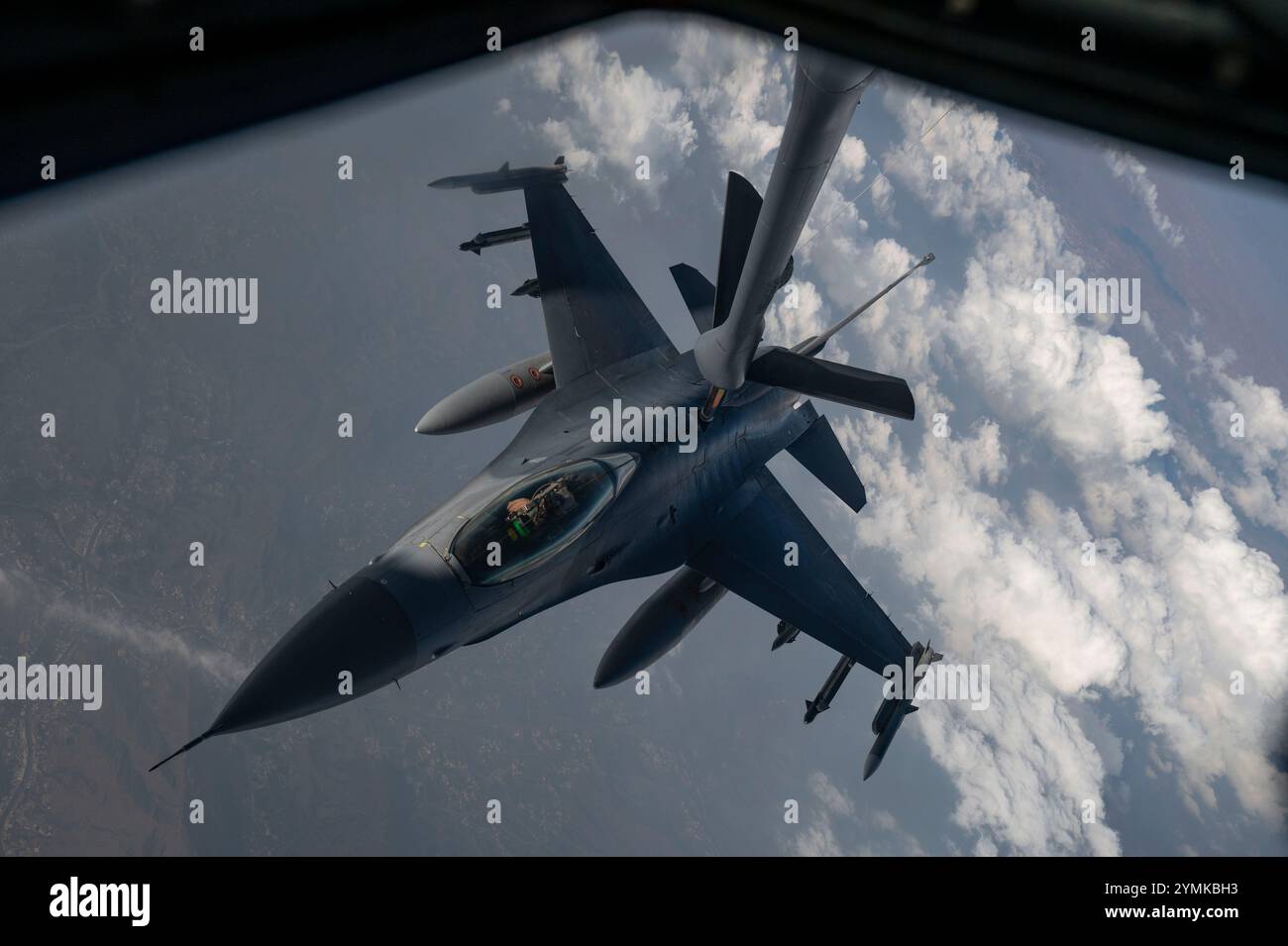 A U.S. Air Force F-16 Fighting Falcon prepares to receive fuel over the ...