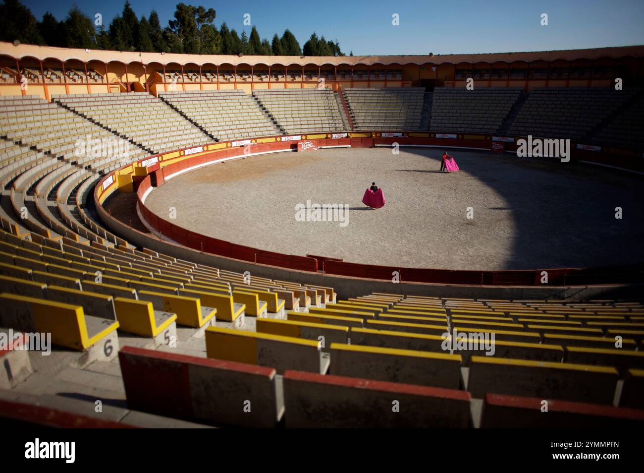 Bullfighters and amateurs practice in the bull ring of Apizaco, Tlaxcala, Mexico. Stock Photo