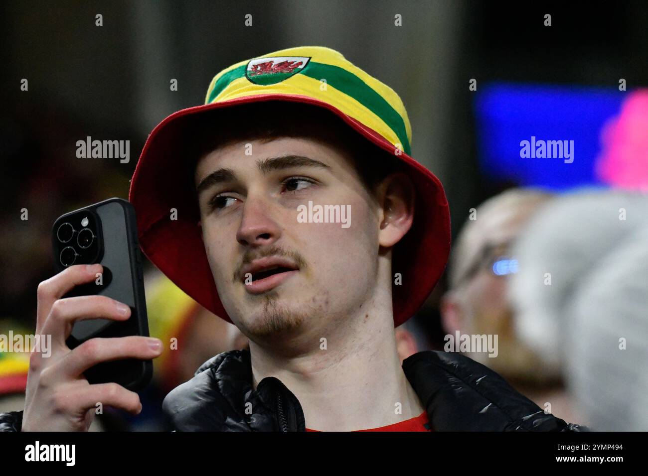 Cardiff, Wales. 19 November 2024. A Wales fan before the UEFA Nations League 2024/25 League B Group B4 match between Wales and Iceland the Cardiff City Stadium in Cardiff, Wales, UK on 19 November 2024. Credit: Duncan Thomas/Majestic Media. Stock Photo