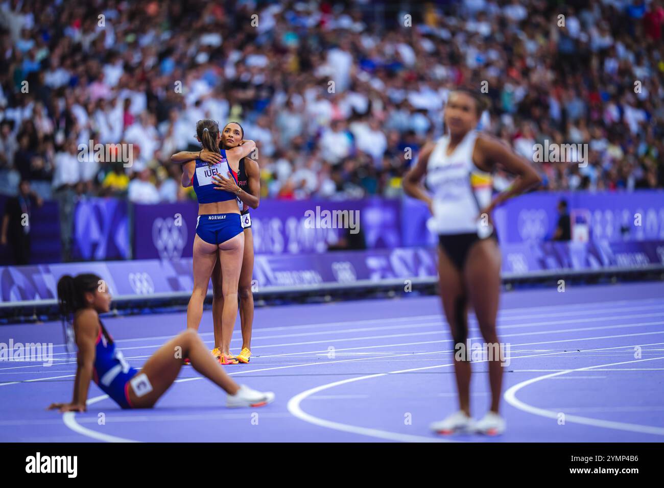 Lina Nielsen participating in the 400 meters hurdles at the Paris 2024 ...