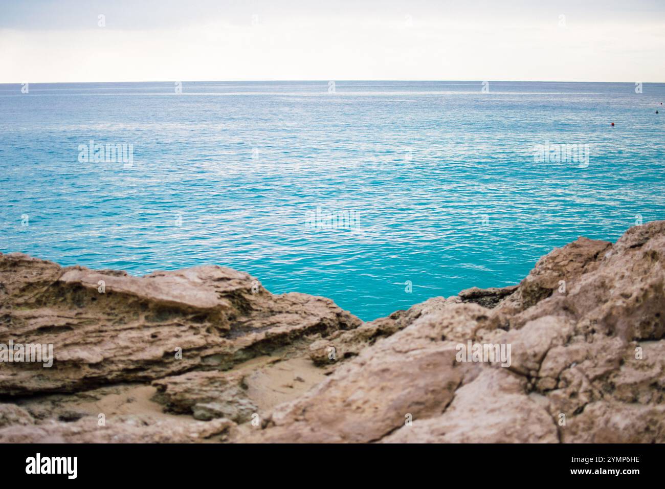 rocky coast with azure water aya napa, cyprus Stock Photo - Alamy