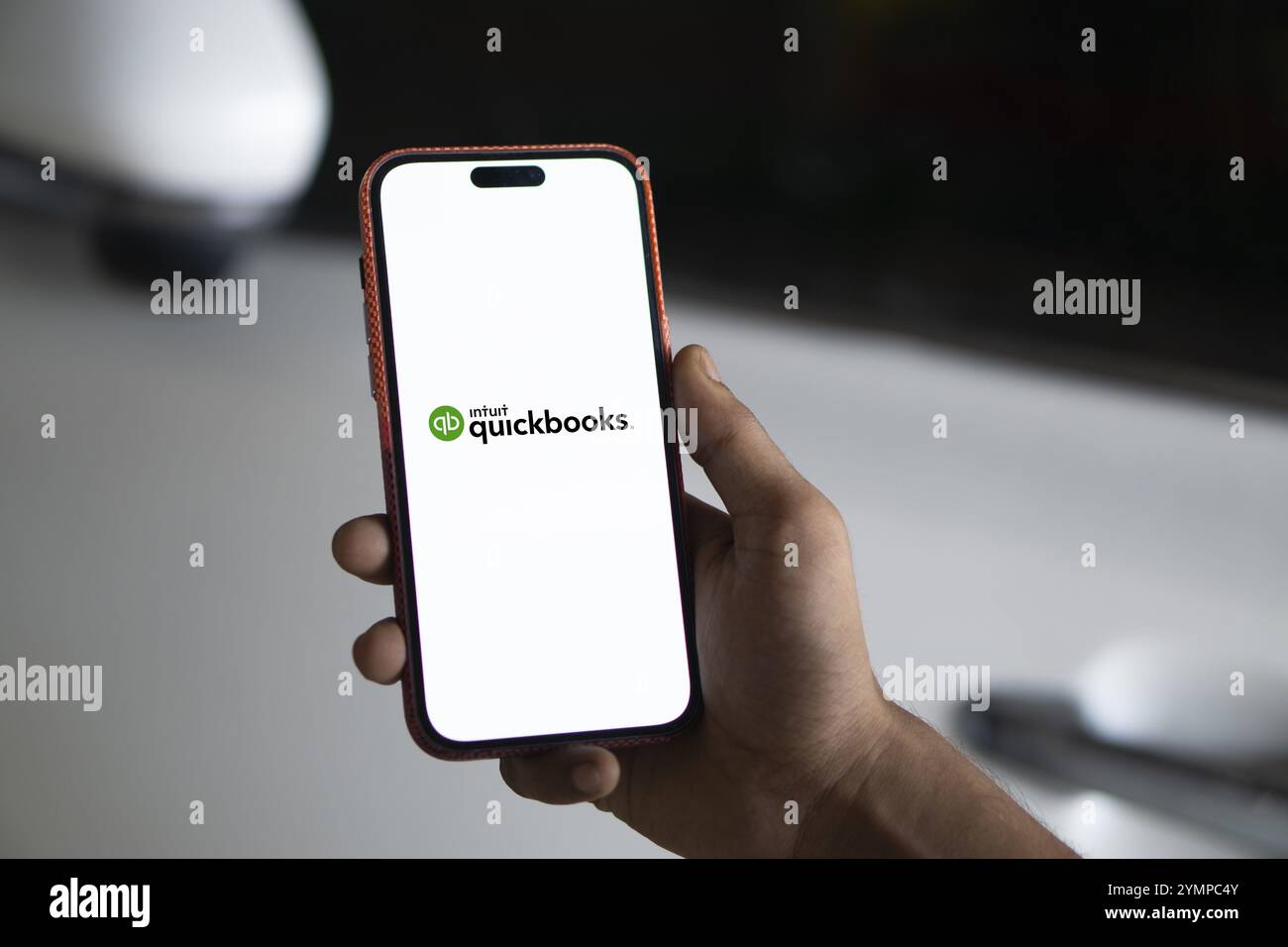 Intuit quickbooks logo is displayed on smartphone. QuickBooks is an accounting software. Stock Photo