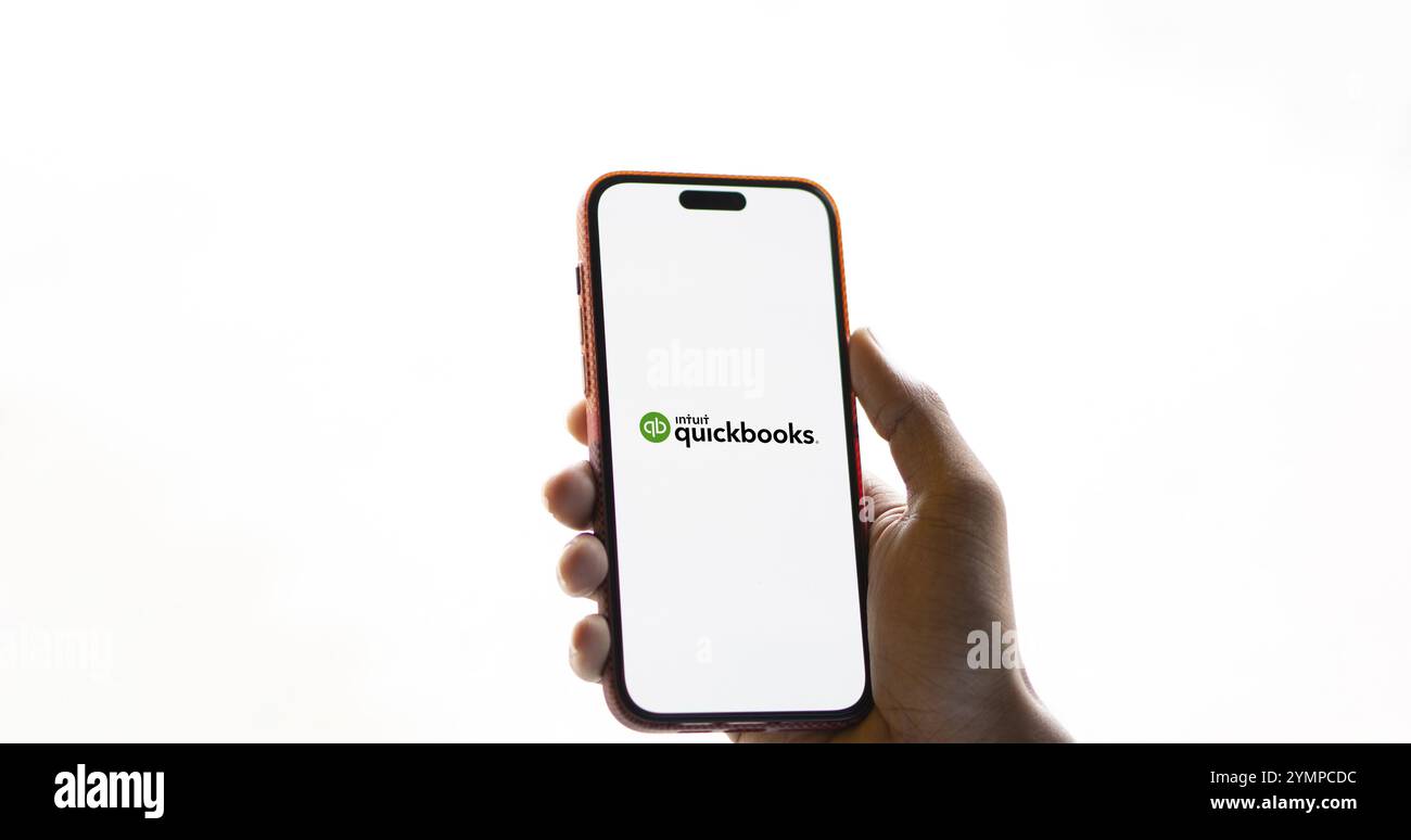 Intuit quickbooks logo is displayed on smartphone. QuickBooks is an accounting software. Stock Photo