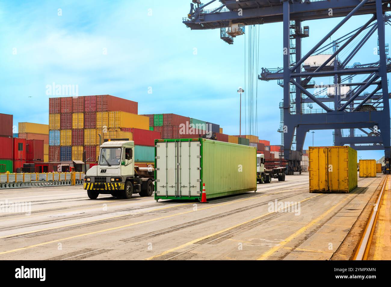 A massive container crane at the Port of San Antonio, Chile, lifts and ...