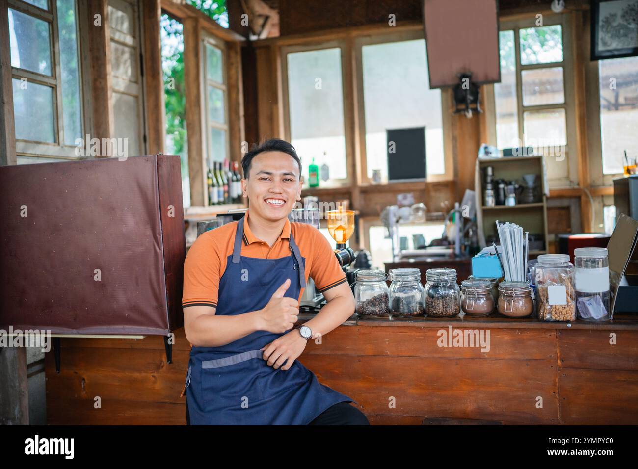 Professional male barista in apron hi-res stock photography and images ...