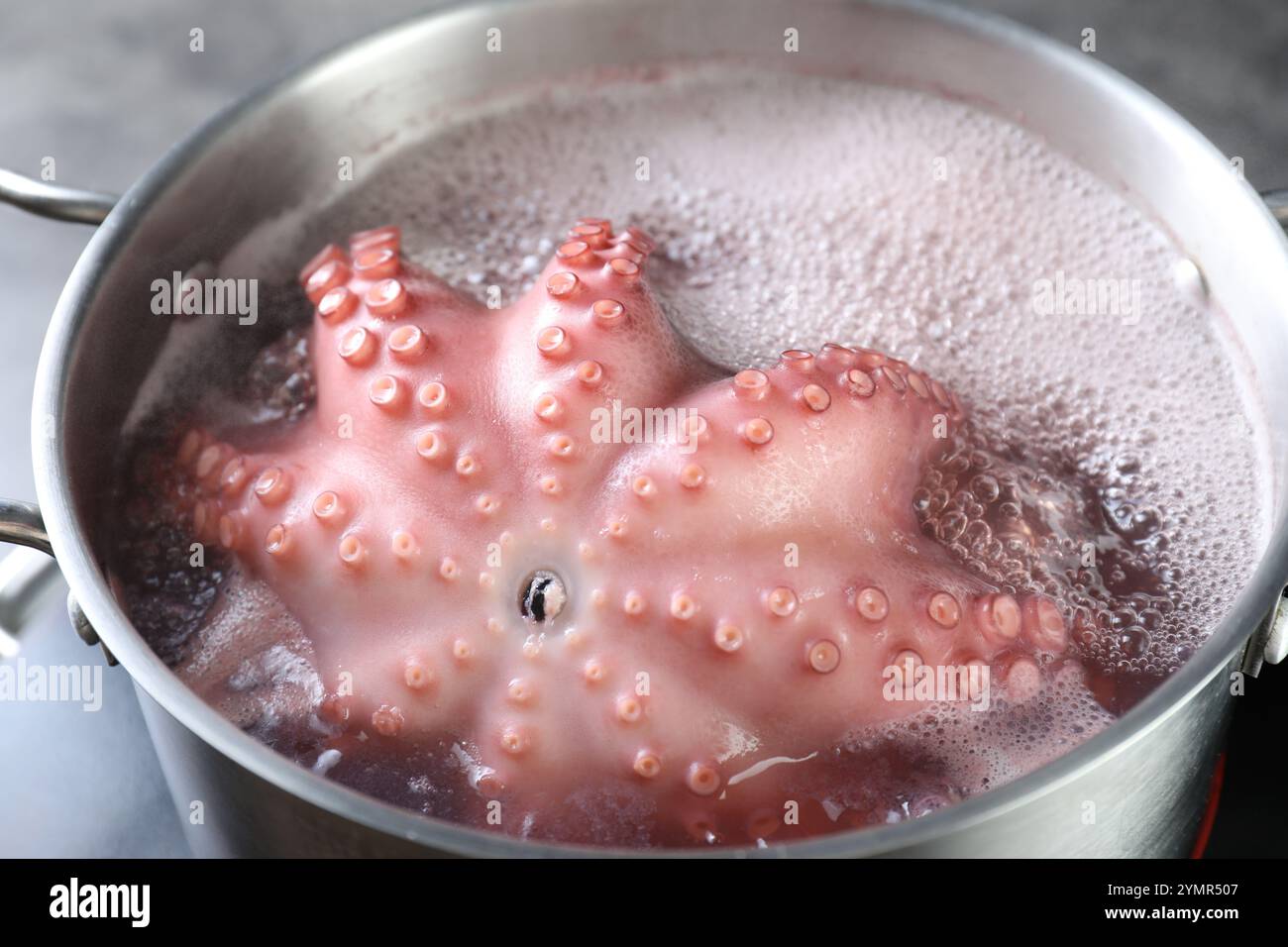 Octopus tentacles boiling in hi-res stock photography and images - Alamy