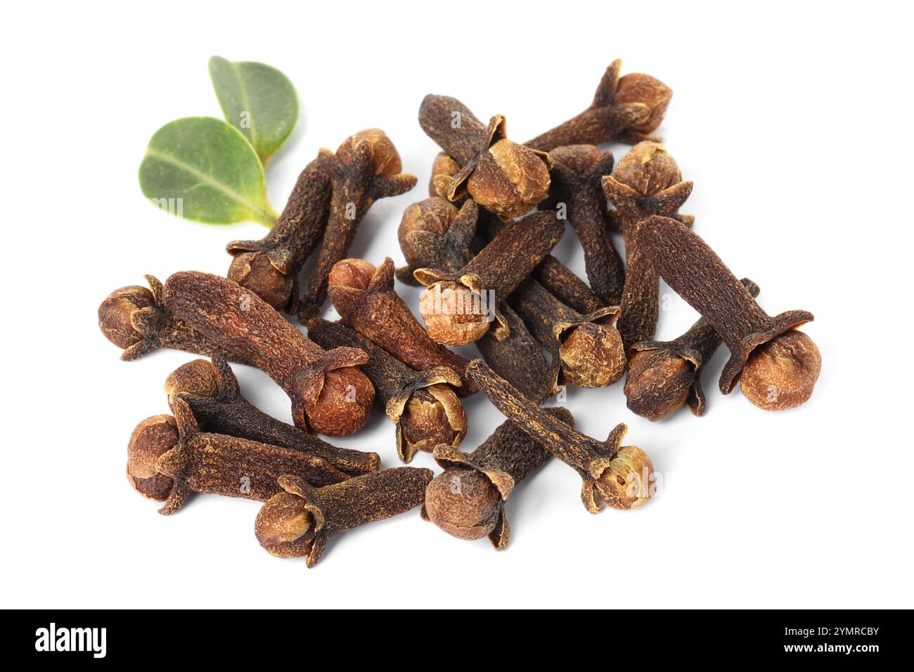 Pile of dry clove buds and green leaves on white background. Aromatic ...
