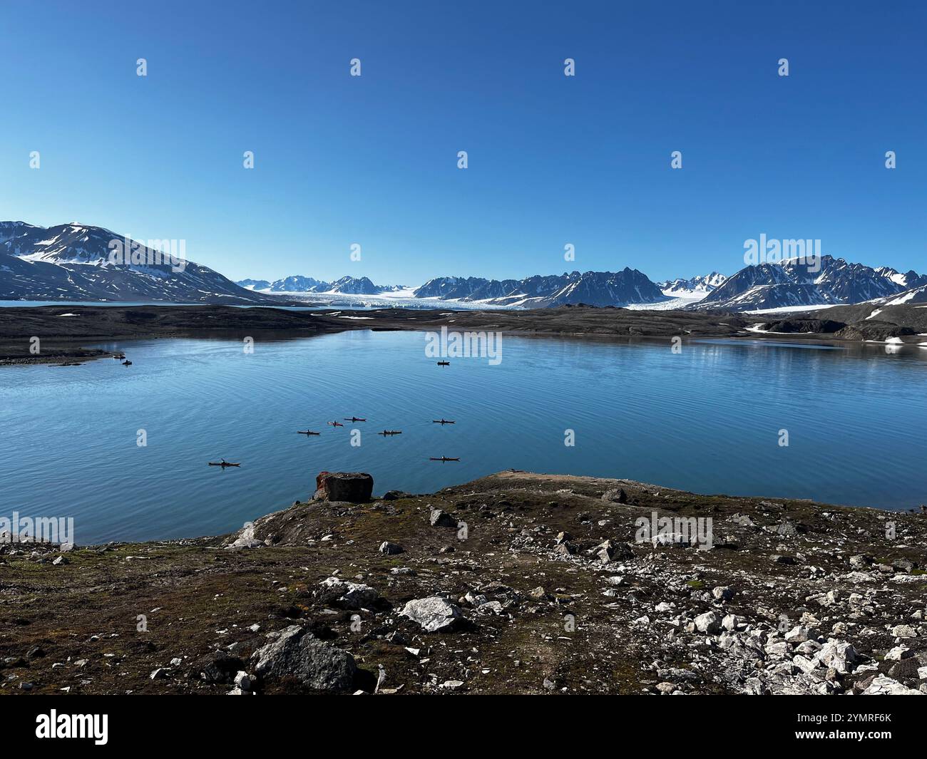Kayaking in Fjord in Svalbard Norway Arctic - Smartphone Captured Stock Image