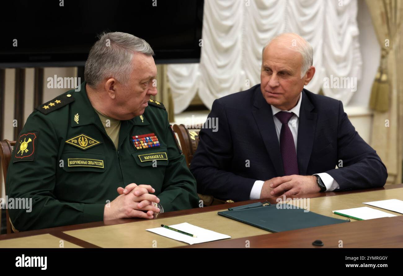 Moscow, Russia. 22nd Nov, 2024. Russian Strategic Missile Forces Commander Gen. Sergei Karakayev, left, and First Deputy Chairman of the Board of the Russian Military Industrial Commission Colonel General Vasily Tonkoshkurov speak before the start of a meeting of military leaders called by Russian President Vladimir Putin, at the Kremlin, November 22, 2024 in Moscow, Russia. Credit: Vyacheslav Prokofyev/Kremlin Pool/Alamy Live News Stock Photo